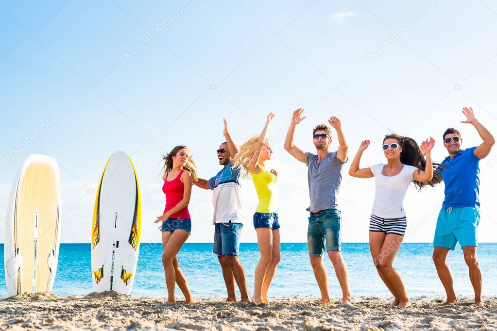 Friends partying at the beach