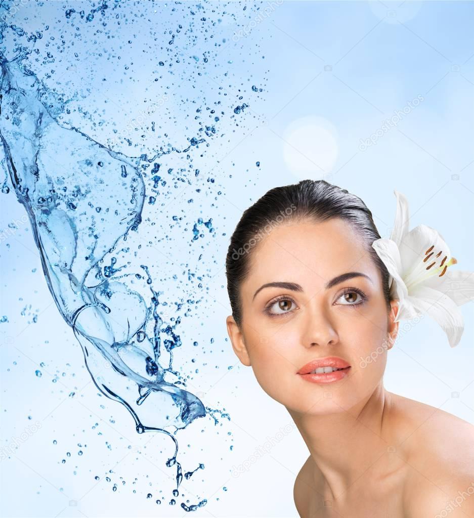 woman with flower and splash of water