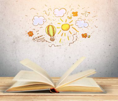 Masanın üzerinde kitabı aç