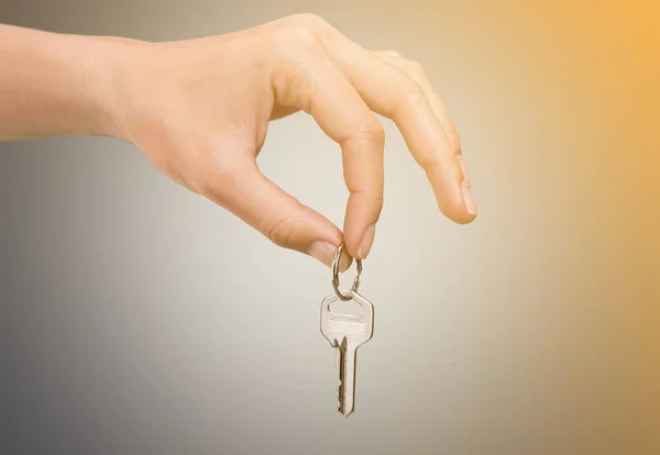 House key in hand — Stock Photo, Image