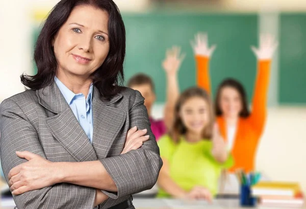 Middle age female teacher — Stock Photo, Image