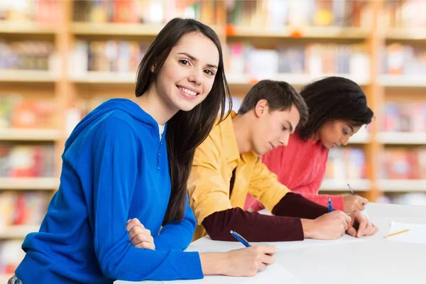 Students sitting in classroom — Stock Photo, Image