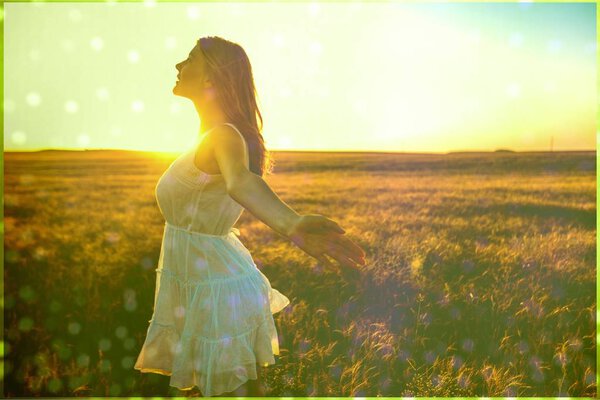 Young woman with arms outstretched