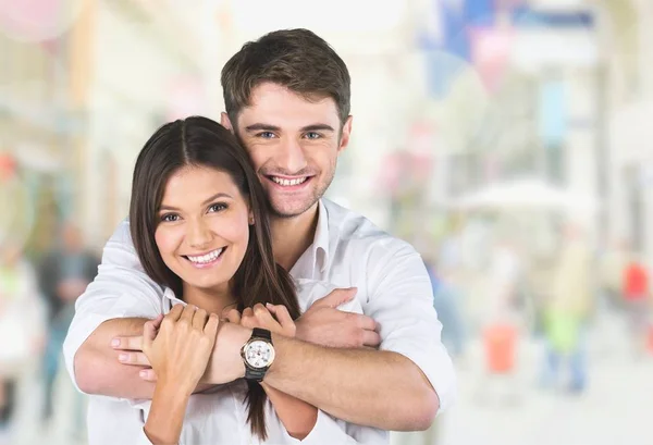 Young couple hugging — Stock Photo, Image