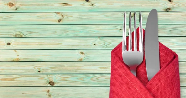 Cuchillo y tenedor en tela —  Fotos de Stock