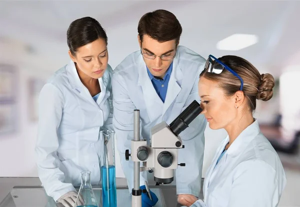 Scientists Working with Microscope — Stock Photo, Image