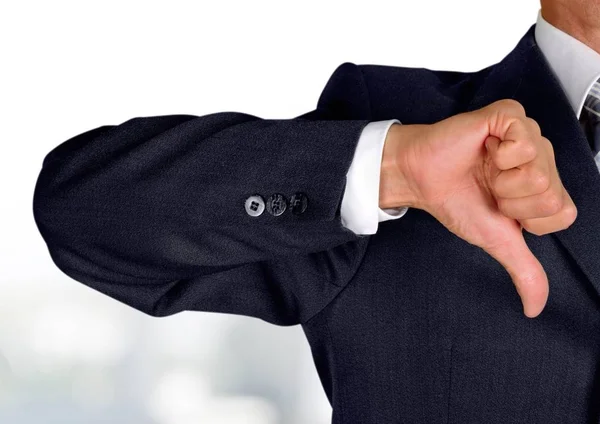 Businessman showing thumb down — Stock Photo, Image