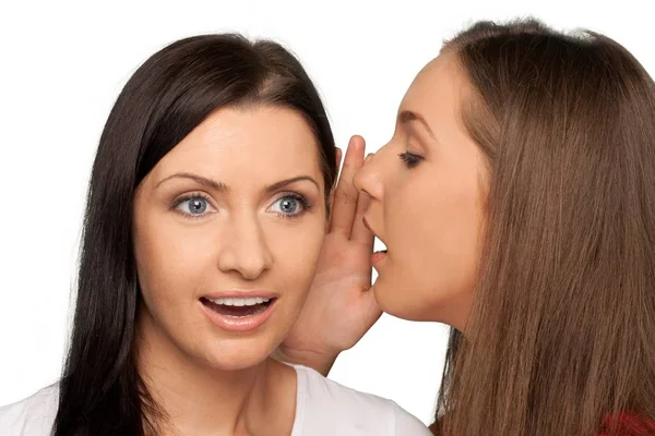 Women gossiping secretly — Stock Photo, Image
