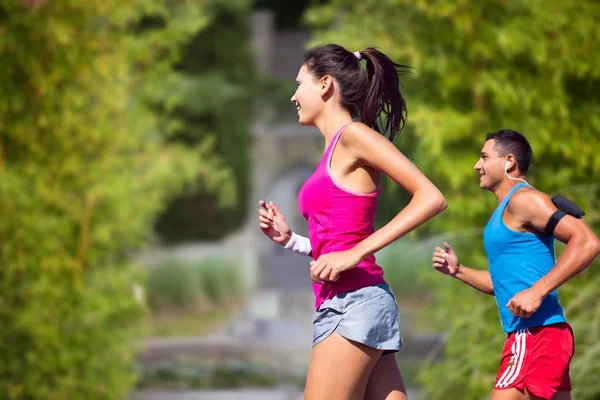 Man and woman running — Stock Photo, Image