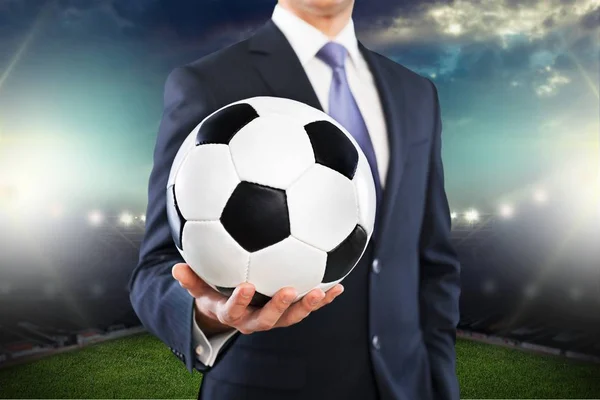 Empresario con balón de fútbol — Foto de Stock