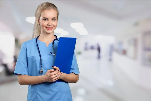 Young female doctor with stethoscope — Stock Photo, Image