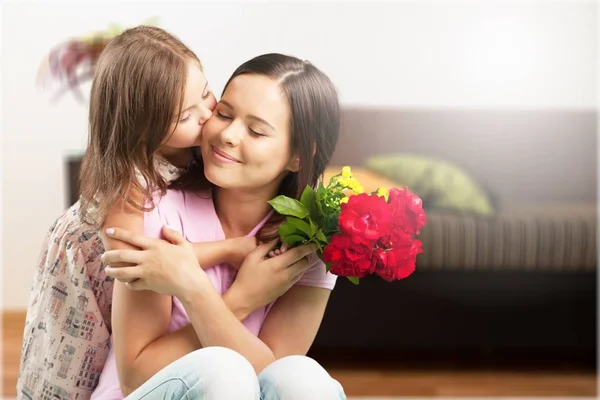 Mother and daughter hugging — Stock Photo, Image