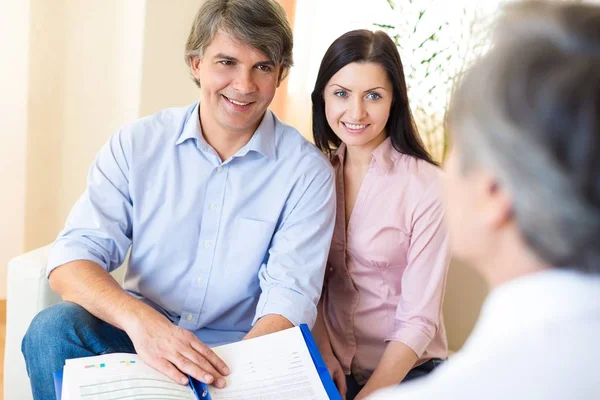 couple meeting financial adviser