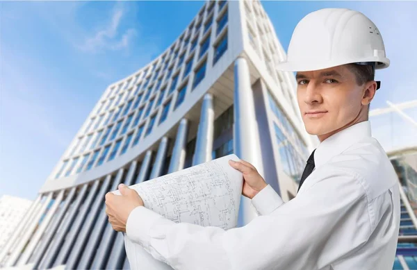 Architect holding blueprint — Stock Photo, Image