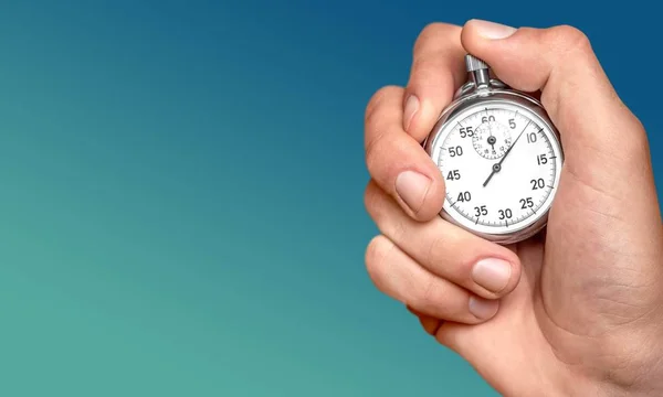 Stopwatch in menselijke hand — Stockfoto