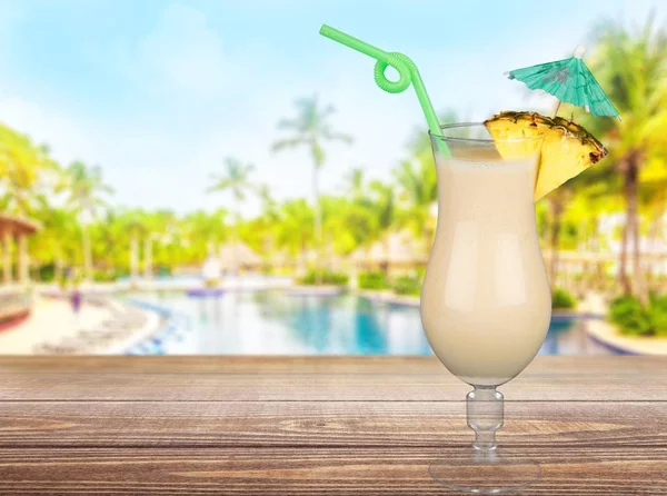 Delicious cocktail with piece of pineapple — Stock Photo, Image