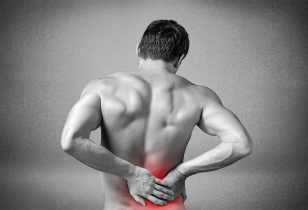 Man die lijden aan pijn in de rug — Stockfoto