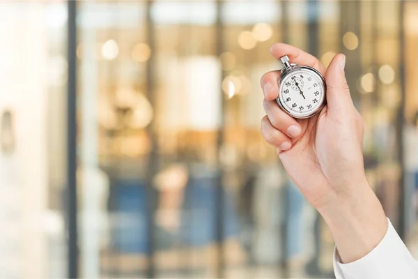 Stoppuhr in menschlicher Hand — Stockfoto