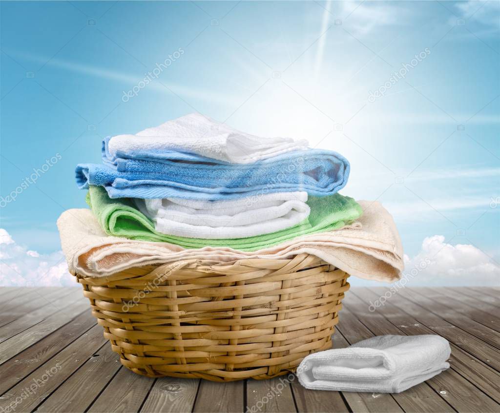 Laundry Basket with colorful towels