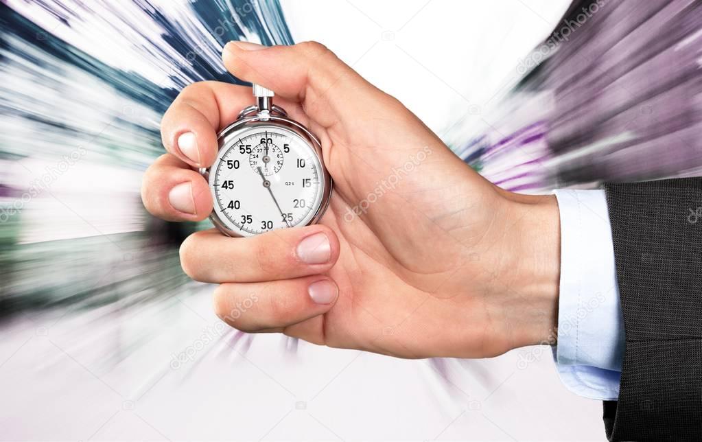 Stopwatch in Human Hand