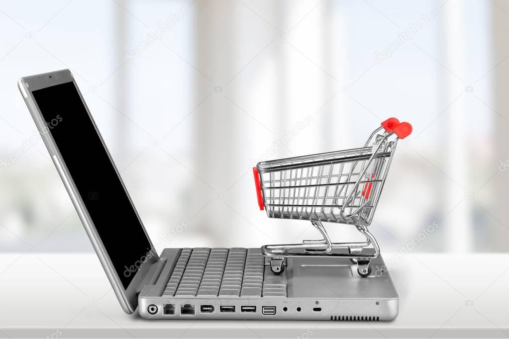 shopping cart on laptop