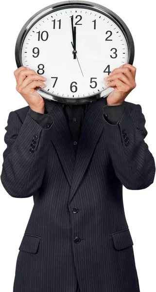 Businessman holding clock in hands — Stock Photo, Image