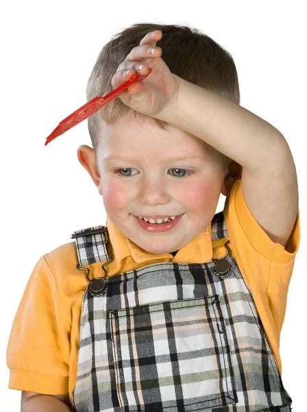 Niño en camisa naranja — Foto de Stock