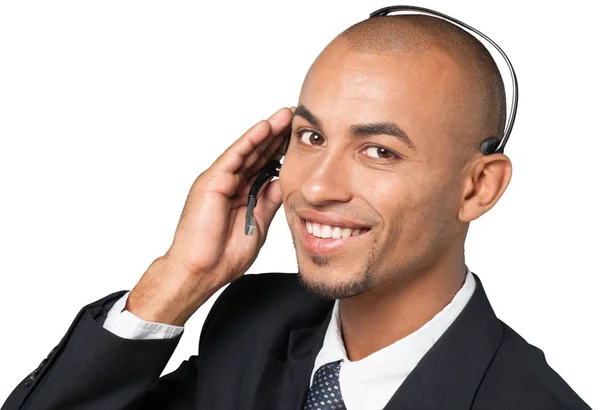Homem sério com fone de ouvido — Fotografia de Stock