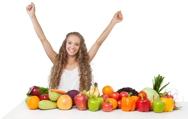 Jonge vrouw genietend van vruchten — Stockfoto