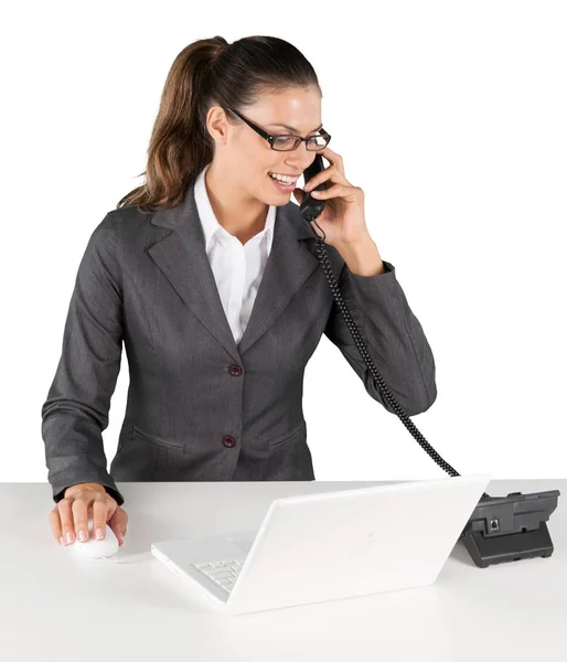 Businesswoman working with laptop and phone — Stock Photo, Image