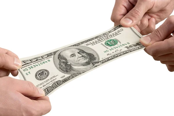 Руки держат банкноту доллара — стоковое фото