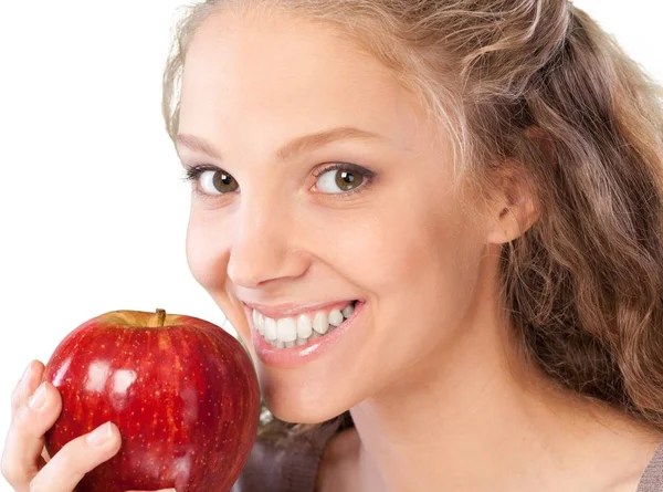 Junge Frau mit Apfel — Stockfoto