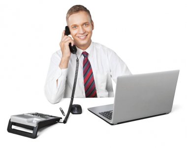 dizüstü bilgisayar ve telefon kullanarak iş adamı