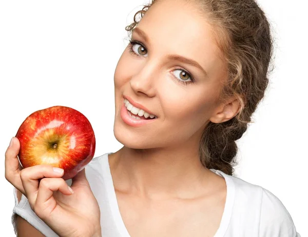 Ung kvinna med äpple — Stockfoto