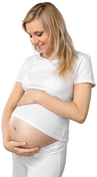 Симпатичная беременная женщина — стоковое фото