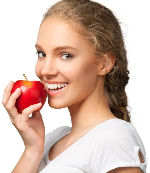 Junge Frau hält Apfel in der Hand — Stockfoto