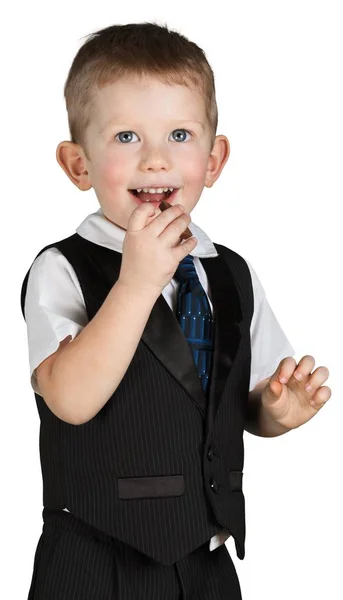 Маленький хлопчик їсть печиво — стокове фото