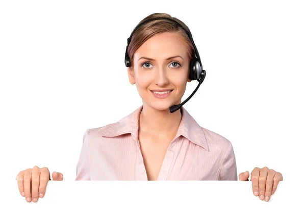 Mujer de negocios en auriculares con letrero —  Fotos de Stock