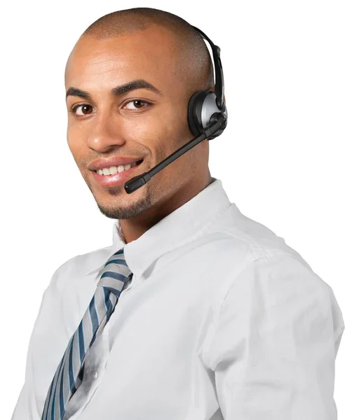 Homem sorridente com fone de ouvido — Fotografia de Stock