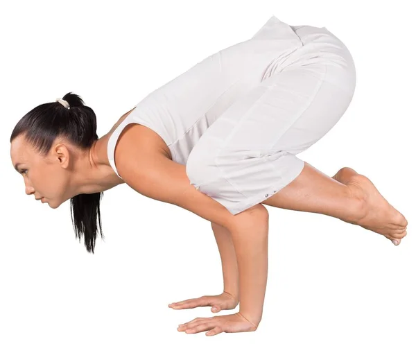 Jonge vrouw doet yoga — Stockfoto