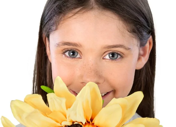 Cute little girl with sunflower — Stock Photo, Image