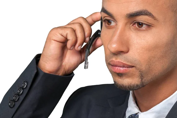 Homem sério com fone de ouvido — Fotografia de Stock