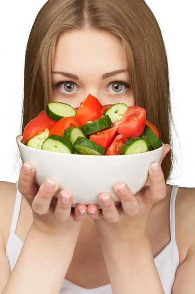 Mujer sosteniendo tazón con ensalada — Foto de Stock