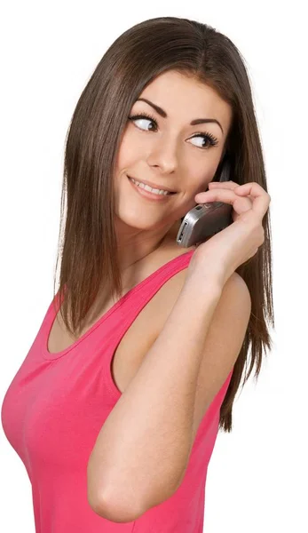 Mulher em camisa rosa com telefone — Fotografia de Stock