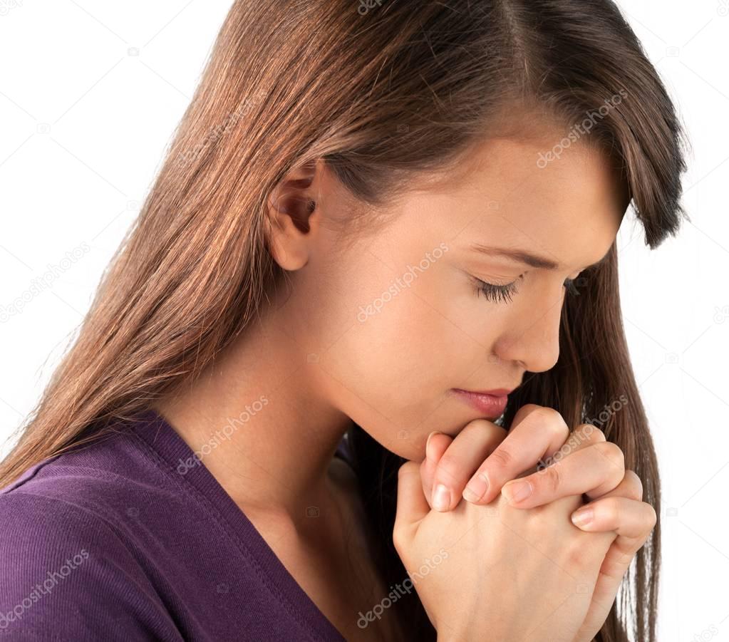 Young woman praying