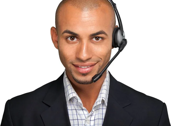 Portrait of a smiling man with headset — Stock Photo, Image