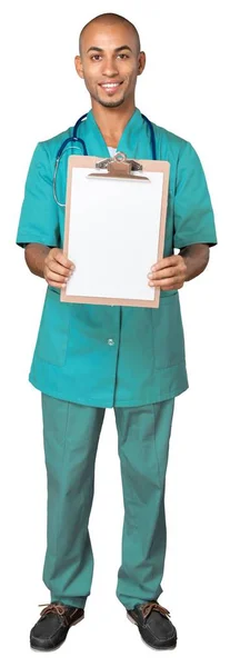 Dokter memegang papan klip — Stok Foto