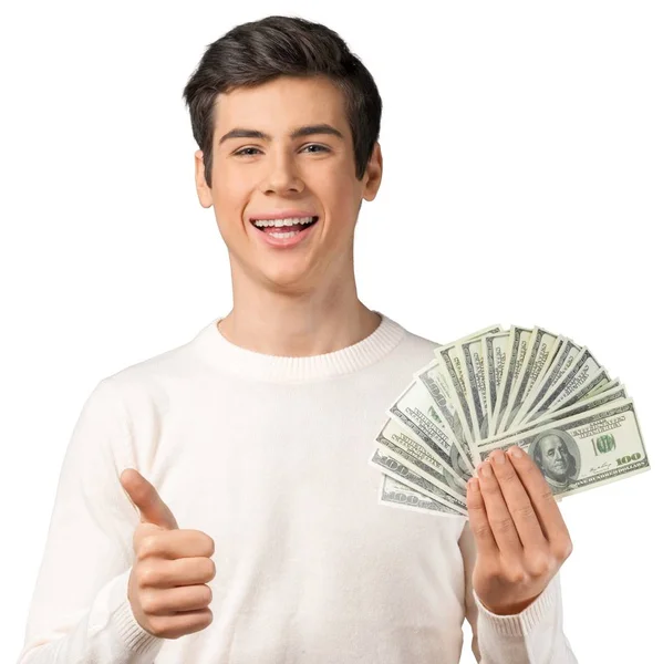 Молодой человек с деньгами — стоковое фото