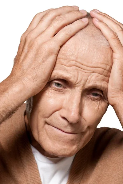 成熟的男人抱着头在痛苦中 — 图库照片