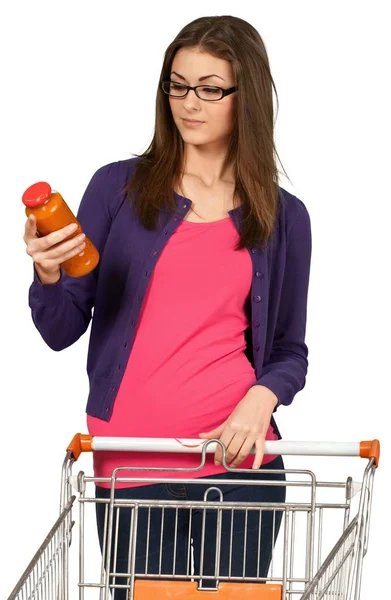 Mulher com carrinho de compras — Fotografia de Stock